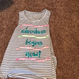 A white and white stripped tank top